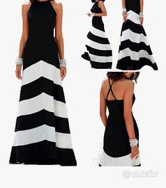 Abito lungo bianco e nero con righe assimetrica.