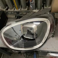 Faro anteriore sinistro Mini