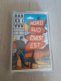 Musicassette NORD SUD OVEST EST 883 ROSSA PRIMA ST