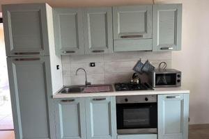 Appartamento piano terra con giardino in B&B