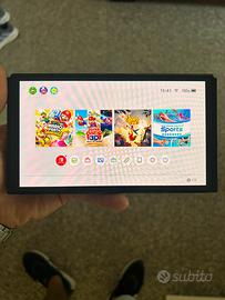 nintendo switch oled+2coppie di joystick+3 giochi