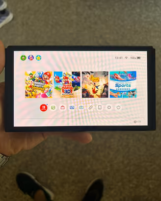 nintendo switch oled+2coppie di joystick+3 giochi