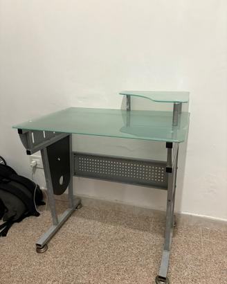 scrivania in vetro da ufficio con rialzo monitor