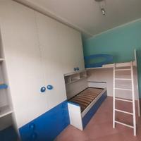 Cameretta doppia con scala.