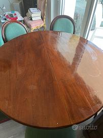 Tavolo rotondo 130 cm legno noce con sei sedie