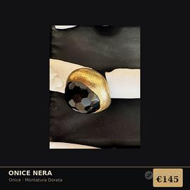 Anello onice nera sfaccettata - montatura dorata