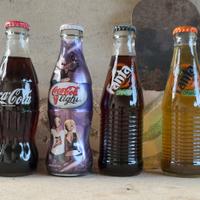 Collezione bottiglie coca cola, fanta e sprite