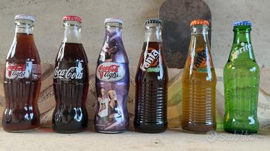 Collezione bottiglie coca cola, fanta e sprite