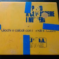 Giochi per bimbi e calcoli con i regoli in colore