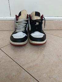 jordan 1 mid rosse bianche e nere