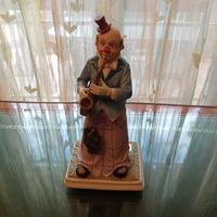 CLOWN IN PORCELLANA CON SASSOFONO-FINE ANNI'80