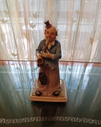 CLOWN IN PORCELLANA CON SASSOFONO-FINE ANNI'80