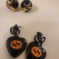 orecchini  ysl e gucci