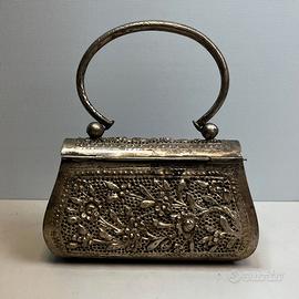 Pochette metallo traforato