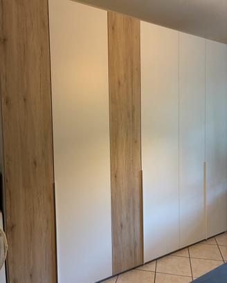 Camera da letto in legno bianco – €1.000