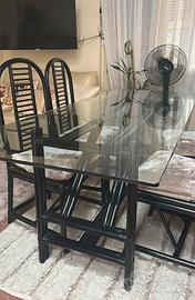 Tavolo in ceistallo con sedie in midollino