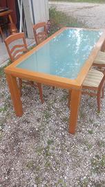 Tavolo calligaris in vetro con 4 sedie.