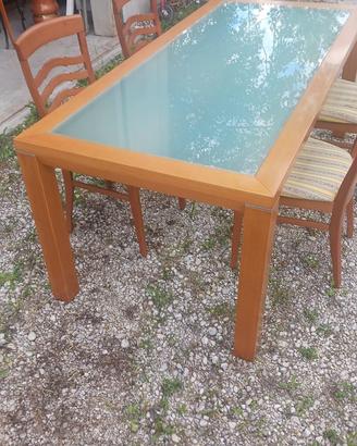 Tavolo calligaris in vetro con 4 sedie.