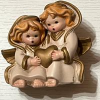 Coppia angioletti ceramica oro