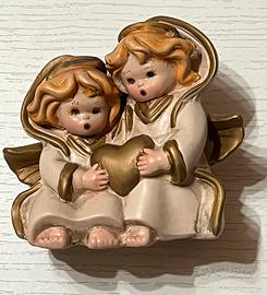 Coppia angioletti ceramica oro