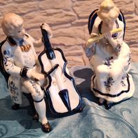  coppia di statuette musicisti in porcellana 