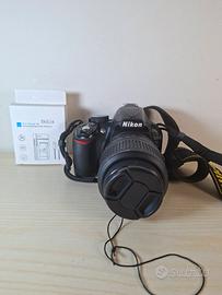 fotocamera nikon d3100, obiettivo, caricabatterie 
