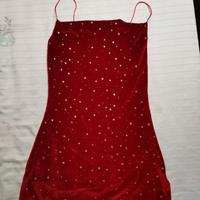 vestito natalizio di velluto rosso con stelline