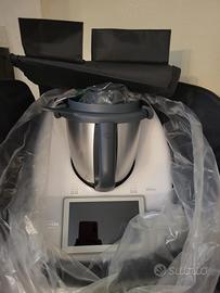 Bimbi TM6 nuovo con garanzia accessori 2 boccali