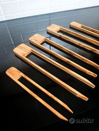 Barbecue pinza per carne salsiccia verdure cucina