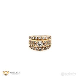 Anello a fascia in oro giallo con diamanti