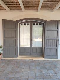 portone e vetrata in legno 