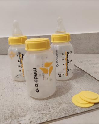 contenitori latte e biberon medela