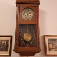 Orologio a pendolo da parete vintage