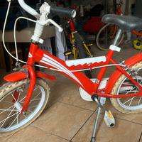 Bicicletta Kinder rossa e bianca