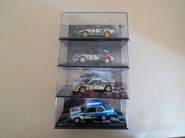 4 MODELLINI FIAT-LANCIA RALLY SCALA 1:43 CON TECA