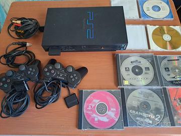 Playstation 2 con controller, cavi e giochi
