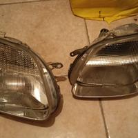 fari anteriori Opel Agila 2004