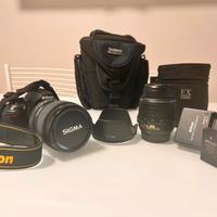 Reflex D3100 con due obiettivi e relative custodie