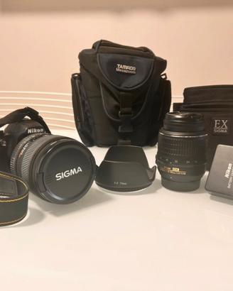 Reflex D3100 con due obiettivi e relative custodie