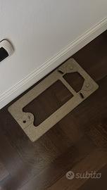 Piastra telefono a gettoni