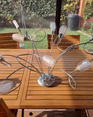 Lampadario a tre fasci di luce