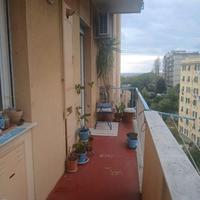 Quarto bilocale arredato con ampio balcone