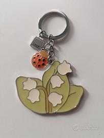 Portachiavi Di Metallo Thun Fiori E Coccinella.