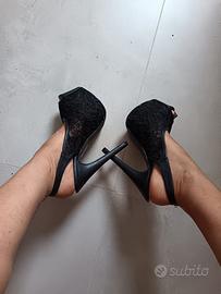 Tacchi alti con plateau 