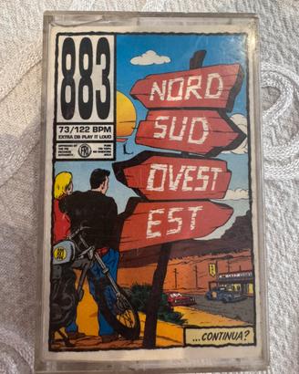 883 - nord sud ovest est  (prima stampa)