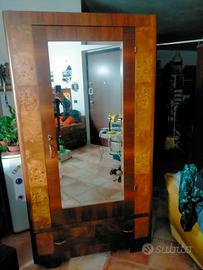 Armadio uno sportello con specchio e cassetto