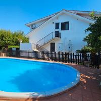 Villa con piscina e giardino di 2000 mq