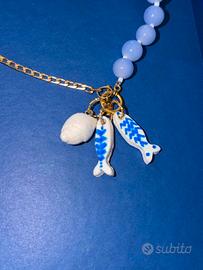 Collana asimmetrica con charm in argilla 