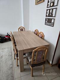 Divano letto angolare + tavolo con 6 sedie