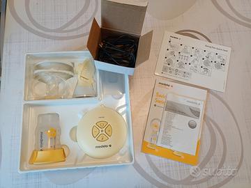 Tiralatte Medela poco usato+alcune starter kit new